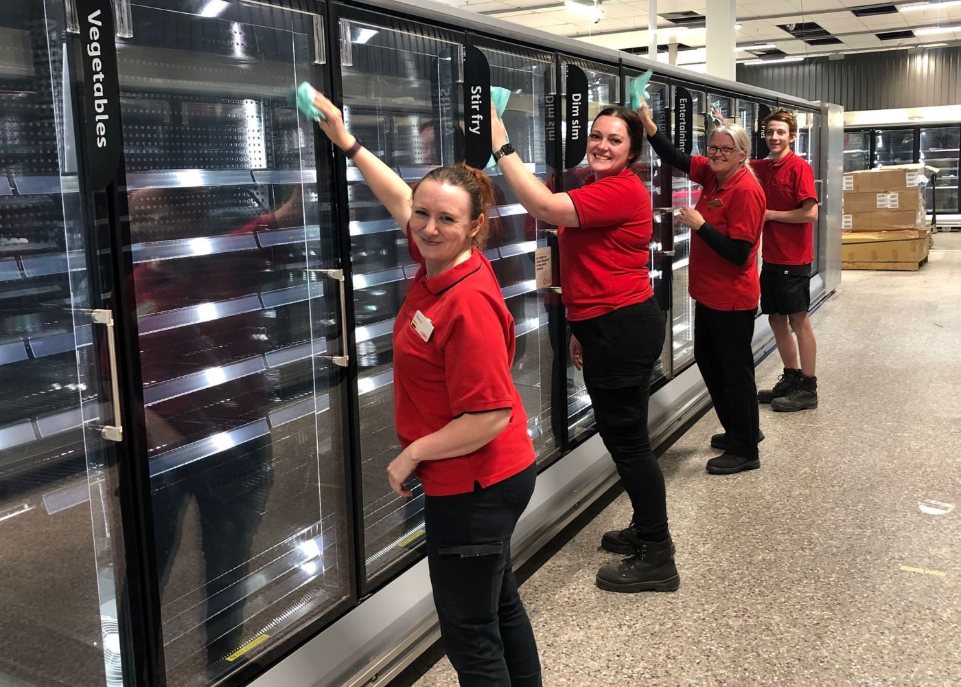 L-R Coles Lismore Store Manager Cheryl, with Carli, Narenea and Cooper helping get the brand new store ready ahead of July 15 opening date